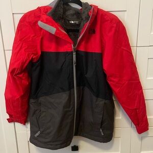 North Face 3-in-1 winter coat. Shell has mesh. Inside lining fleece. Waterproof.